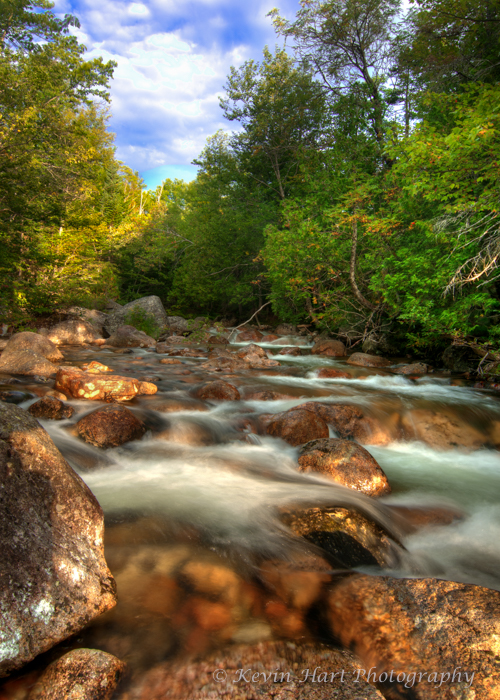 Roaring Brook the morning we left for our hike. As you can see, my sense of composition has improved, as I used the river rocks to create a sense of depth. My technical ability has also grown, as I now shoot with a long exposure to create an artistic effect in the water, and I blend exposures together to reveal all the tones across high-contrast scenes.