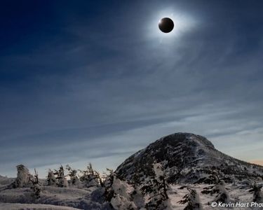 "Moon over Vermont" - The 2024 Solar Eclipse hangs over the Chin on Mt. Mansfield, Vermont's highest point, during totality.