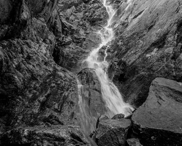 "The Pinnacle Gully" - Melting snow in June continues to carve out the steep Pinnacle Gully in Huntington Ravine on Mt. Washington. 