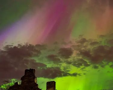 "House of the Rising Lights" - The 5/10/24 aurora show over the old Robinson Tavern in Altona, NY.