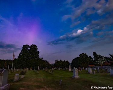 "Spirit Raiser" - An aurora substorm pops out above a cemetery in Morrisville, VT.