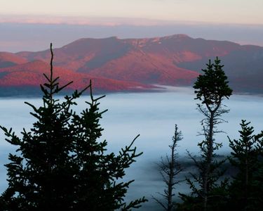 "Sea of Cloud" (Mt. Mansfield in morning alpenglow above a blanket of fog. Stowe, VT.)