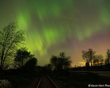 "The Path to the Heavens" - An explosion of aurora color reflecting off some railroad tracks in West Swanton, VT.