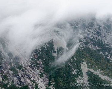 "Summit Swirls" - Fierce wind pushes clouds around Baxter Peak, the summit of Mt. Katahdin, as seen from Pamola Peak.