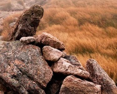 "Tablelands I" - Cairns guide a hiker through the wind and fog in the tablelands on descent from Baxter Peak.