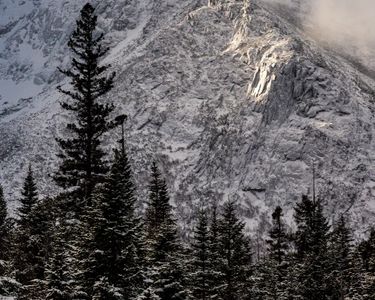 "Pillars of the Unknown" - Maine's Katahdin, the "Greatest Mountain," scraping the clouds while the sun lights up the rock spires known as the Cathedrals.