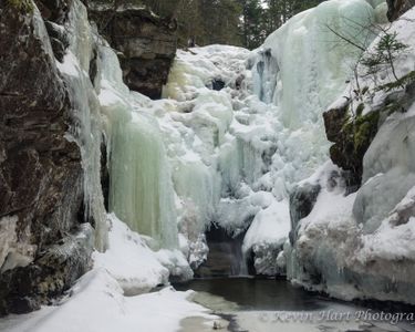 "The Great Frozen Owl of Hawthorne Falls": Hawthorne Falls begins to melt in the spring. Mt. Garfield, White Mountains, NH.