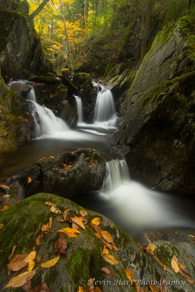 Waterfall in Vermont with autumn foliage.