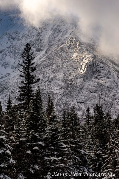 "Pillars of the Unknown" - Maine's Katahdin, the "Greatest Mountain," scraping the clouds while the sun lights up the rock spires known as the Cathedrals.