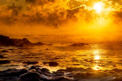 "Emergence" - Whaleback Lighthouse in Kittery, ME, during a sunrise "sea smoke" event.