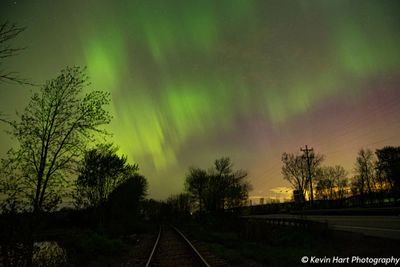 "The Path to the Heavens" - An explosion of aurora color reflecting off some railroad tracks in West Swanton, VT.