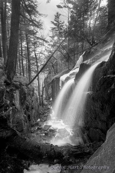 A waterfall in Vermont appears with a double veil during spring melt.