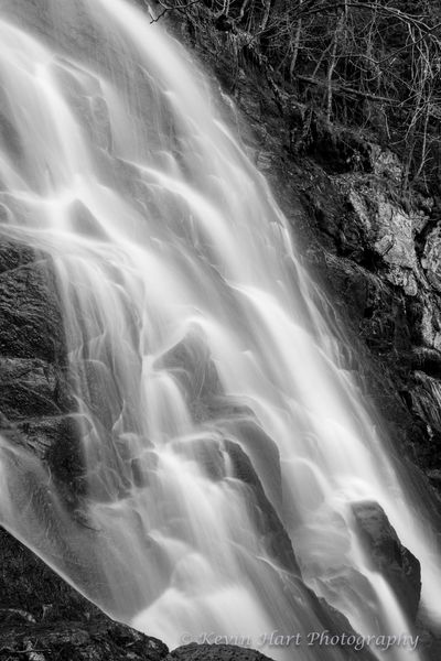 Close up black and white shot of Woodbury Falls in Vermont.